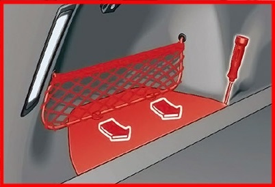 Ubicación del fusible en el maletero, detrás del panel del suelo izquierdo.